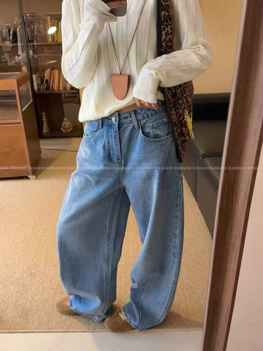 ASYMMETRICAL HEM JEANS