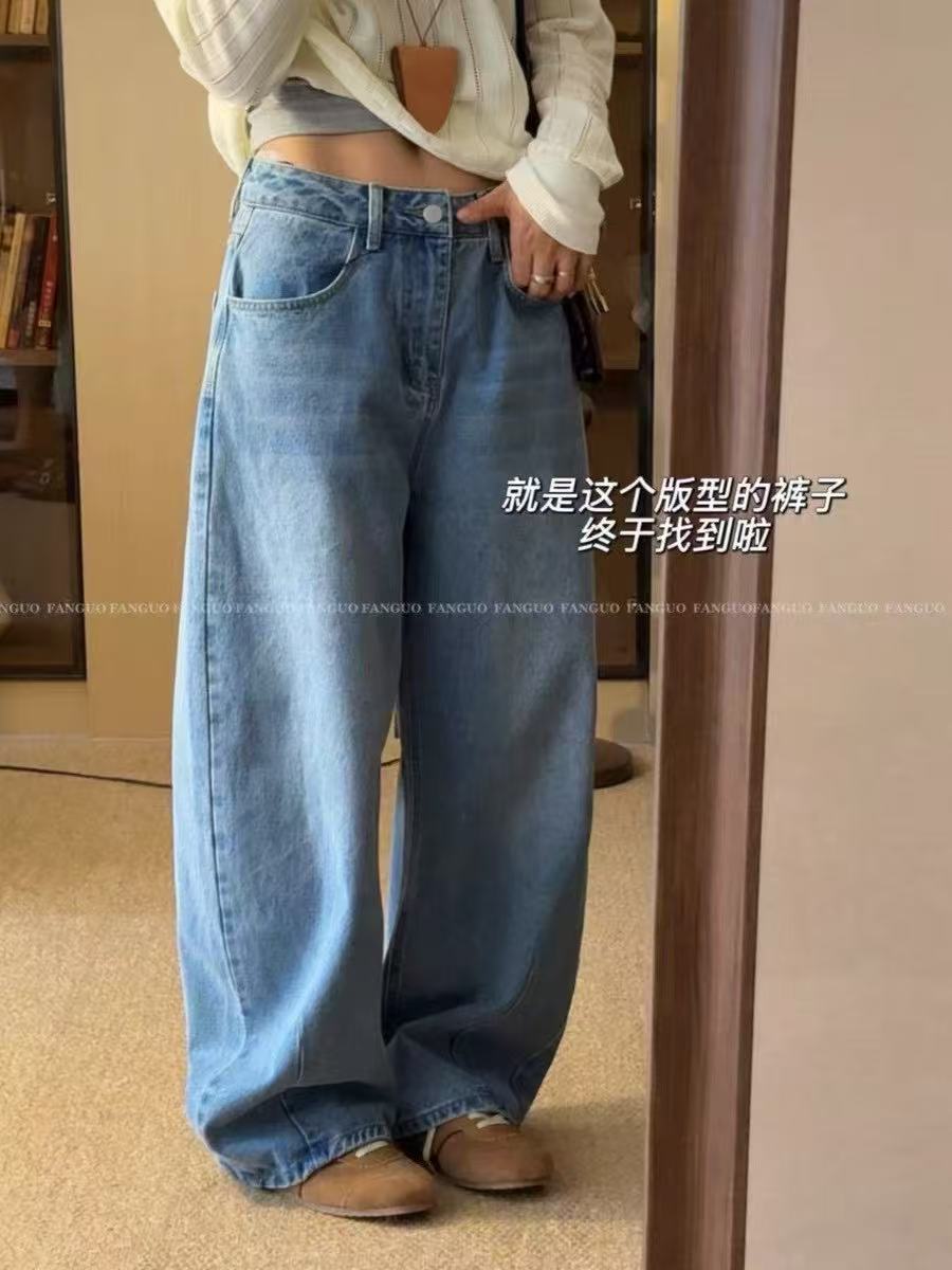 ASYMMETRICAL HEM JEANS