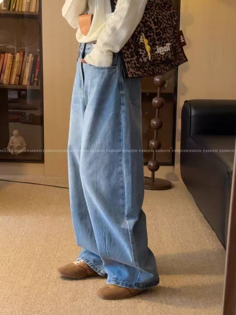 ASYMMETRICAL HEM JEANS