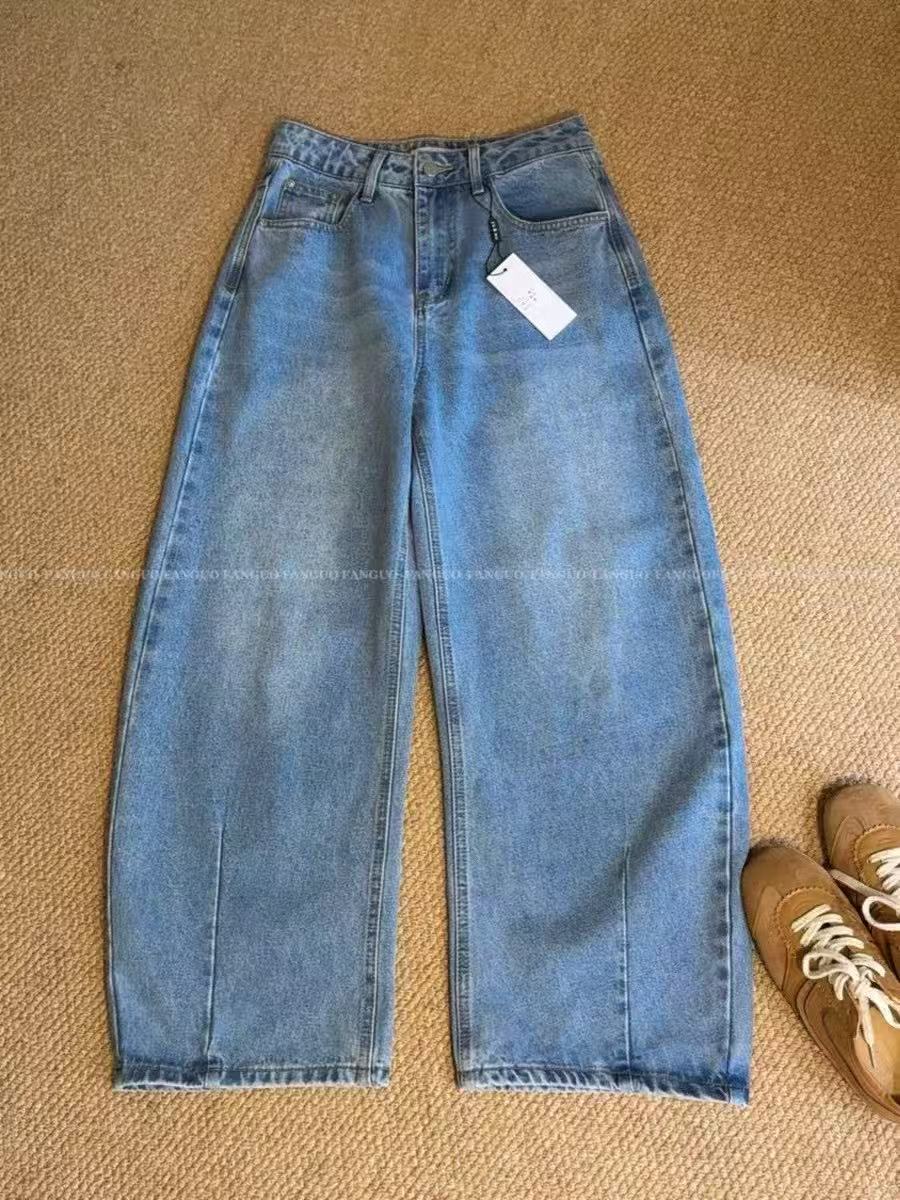ASYMMETRICAL HEM JEANS
